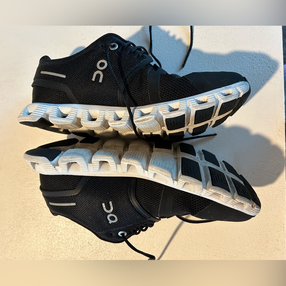 On Running Charcoal and White Athletic Shoes